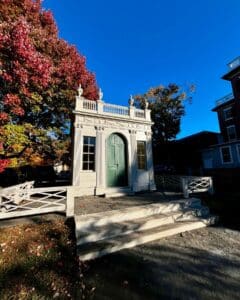 Neoclassical Derby-Beebe Summer House surrounded by vibrant autumn trees in Salem, Massachusetts