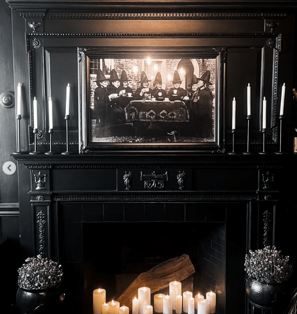 othic Black Fireplace with Witchcraft-Themed Decor at Blackcraft Salem