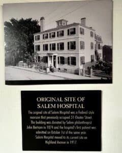Historic photograph of the Federal-style mansion at 31 Charter Street in Salem, Massachusetts, accompanied by a plaque detailing its history as the original site of Salem Hospital.