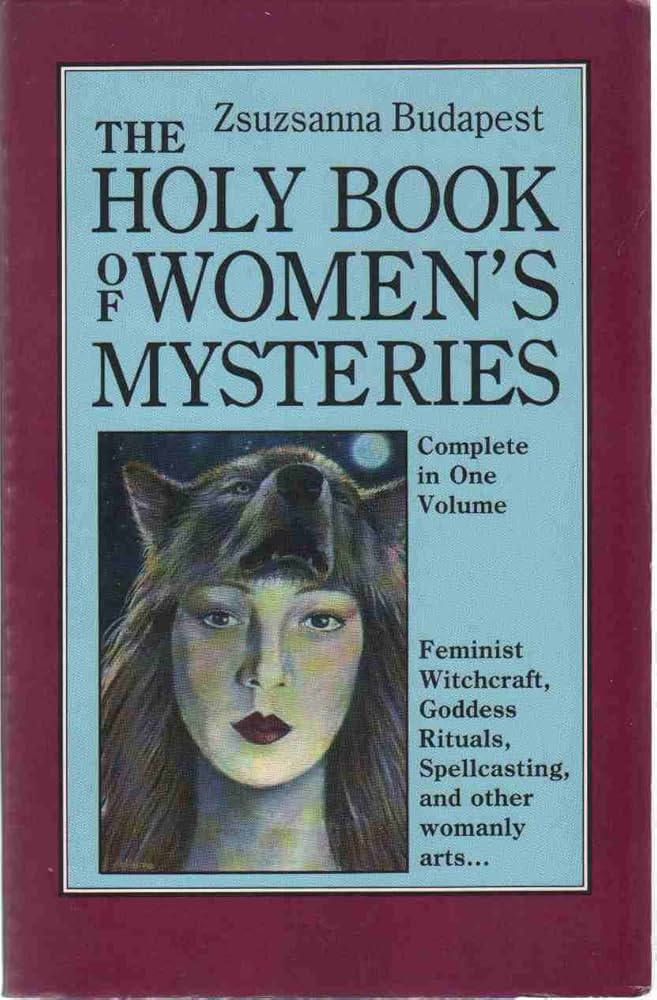 The cover of The Holy Book of Women’s Mysteries by Zsuzsanna Budapest features a striking design framed by a deep burgundy border. The title, written in bold black text against a light blue background, highlights the book's focus on feminist witchcraft, goddess rituals, spellcasting, and "other womanly arts." Below the title is an illustration of a woman’s face with long hair and red lips, blending seamlessly into the image of a wolf’s head, symbolizing the connection between women, nature, and primal wisdom. A crescent moon shines in the background, further emphasizing themes of the divine feminine and mystery. The text "Complete in One Volume" underscores its comprehensive approach to women's spirituality.