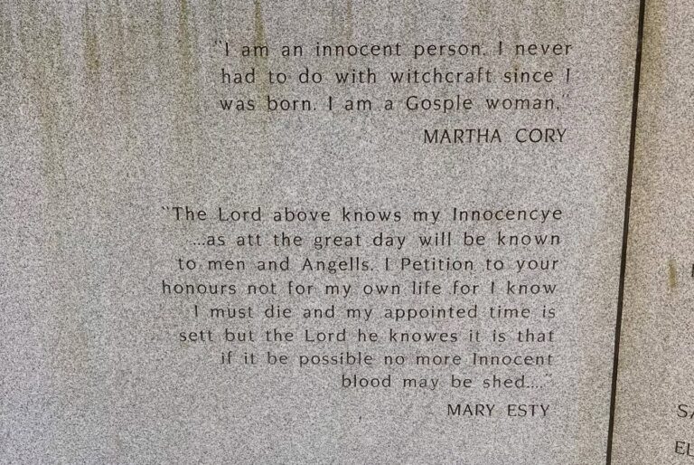 An engraved stone at a Salem memorial featuring the heartfelt declarations of innocence from Martha Cory and Mary Esty during the Salem witch trials.