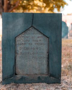 Close-up of Captain Richard More's gravestone in Salem, Massachusetts, inscribed with details of his life as a Mayflower pilgrim who died in 1692 at the age of 84.