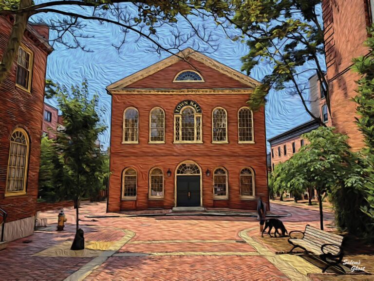 Old Town Hall in Salem, Massachusetts, featuring its classic red-brick exterior, tall arched windows, and charming brick plaza.